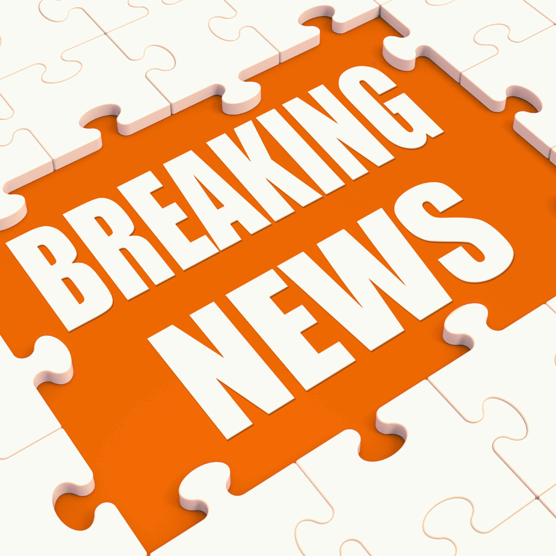 Text on orange coloured background surrounded by white jigsaw pieces, saying "breaking news"